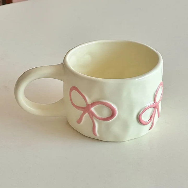 Dainty Bow ceramic mug – charming bow handle design – Die‑Tassen.de