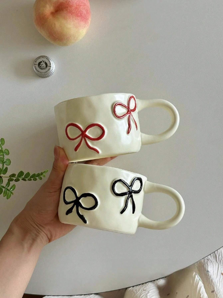 Dainty Bow ceramic mug – charming bow handle design – Die‑Tassen.de