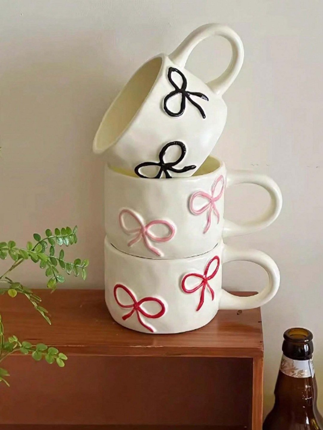 Dainty Bow ceramic mug – charming bow handle design – Die‑Tassen.de