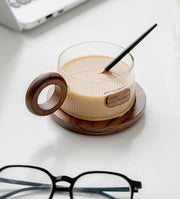 Lichtfall glass mug – elegant curves design with tray and spoon – Die‑Tassen.de
