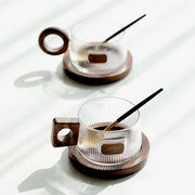 Lichtfall glass mug – elegant curves design with tray and spoon – Die‑Tassen.de