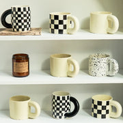 Retro ceramic mug 300 ml – white & black checker with white handle – Die‑Tassen.de